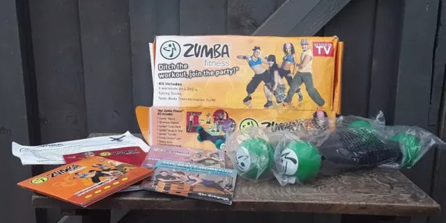 Zumba Fitness DVD Box Set with Toning Sticks & Total Body Guide Dumbells