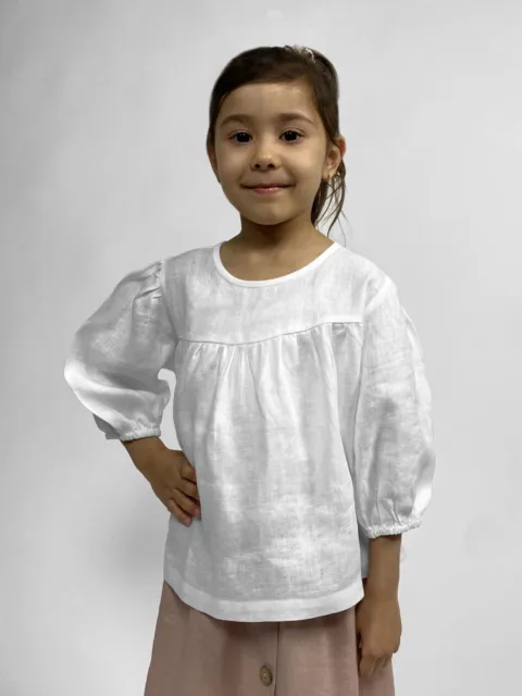 Top in lino bianco per bambine modesto con maniche ad un quarto