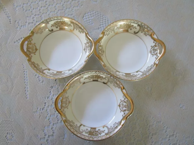 Vintage 3 Noritake small dish with handles , cream and gold 14 cms.