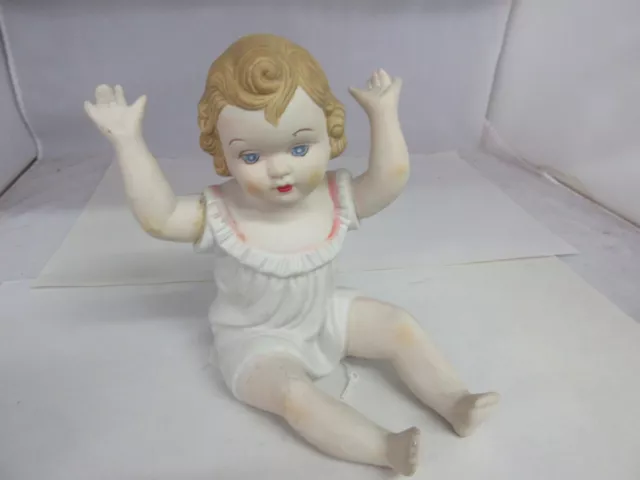 Vintage Bisque Porcelain Piano Baby  G-804