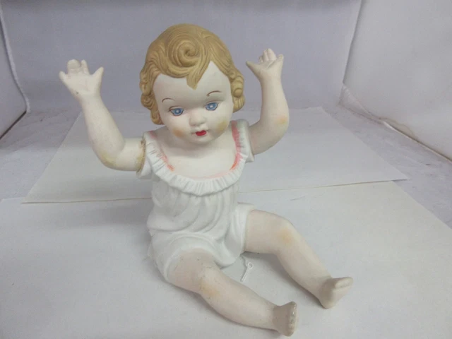 Vintage Bisque Porcelain Piano Baby  G-804