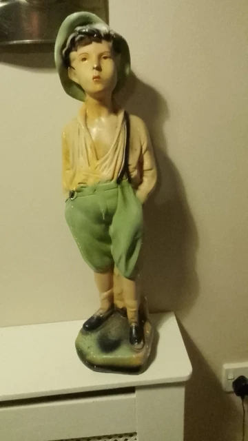 Whistling boy best sale figurine