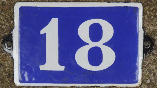 Old blue French house number 18 door gate wall fence street sign plate plaque