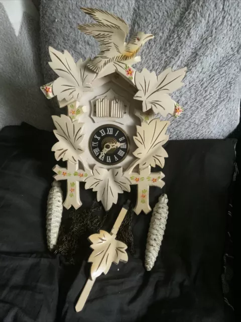 antique black forest cuckoo clock white