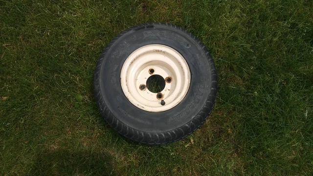 215/60/8  18.5x8.50-8 tire on a 4x4 bolt pattern rim for trailer/golf cart