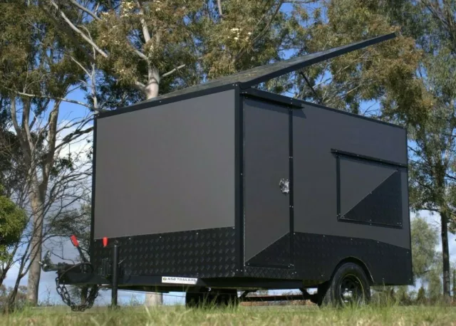 Enclosed Charcoal Gray Trailer With Work Bench and Mesh