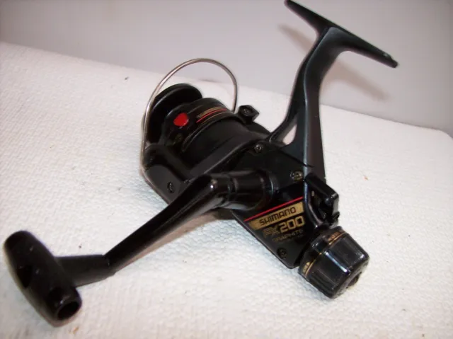 VINTAGE SHIMANO FX 200 Spinning Fishing Reel Graphite Japan Quickfire  2,Ex.Cond. $12.95 - PicClick