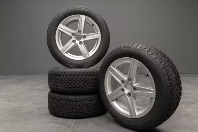 Ruote complete cerchi lega originali Audi 7JX16" ET48 Bridgestone 205/55 R16 91H