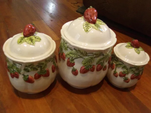 https://www.picclickimg.com/GqAAAOSwsuJi3FHJ/Vintage-SUNSHINE-Strawberry-Canister-Set-Of-3-W-Lids.webp