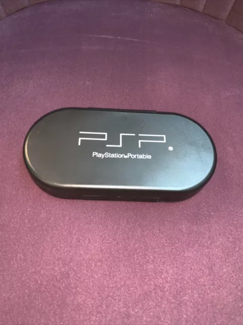 1 Sony PSP Playstation Portable Black Hard Clamshell Holds 8 UMD Magnetic Case 1 Sony PSP Playstation Portable Black Hard Clamshell Holds 8 UMD Magnetic Case