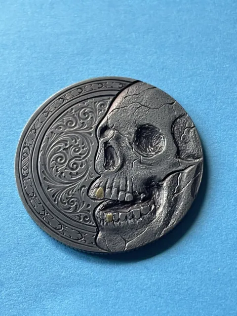 hobo coin hand carved 1971 Peso by artist AG Skull with scrolling and Gold inlay