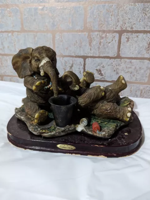 Large The Juliana Collection mother elephant with baby playing and drinking wate