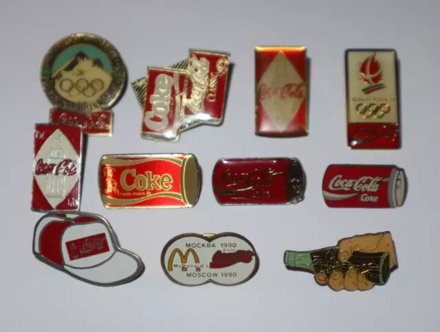 Lot de 11  Pin's + Attaches Thème Coca Cola Boisson Canette JO Mac donald