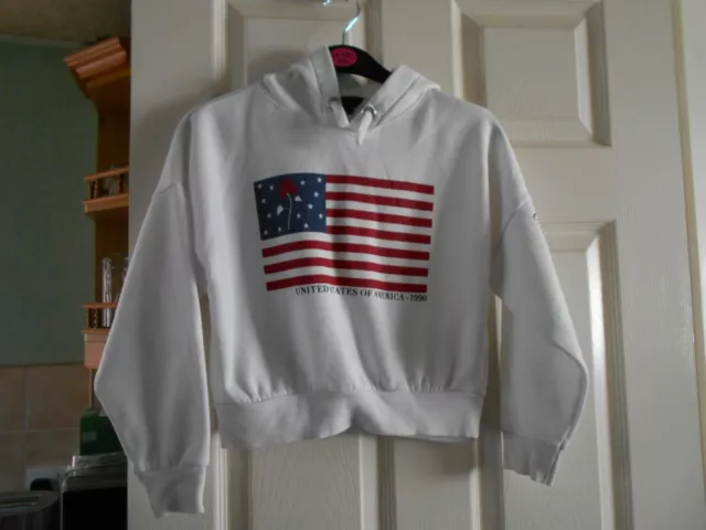 M219: New Look 915, age 9 yrs, girls white long sleeve hoodie, USA logo