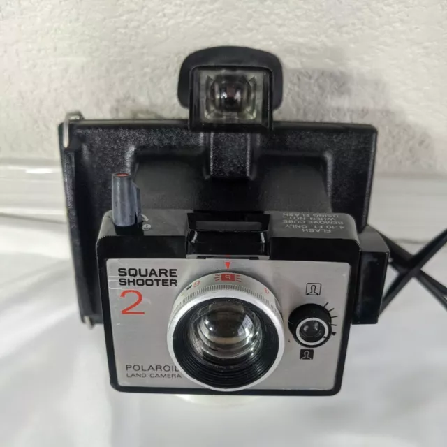 Polaroid cámara terrestre tirador cuadrado 2 clip frío tipo 88 película vintage interior