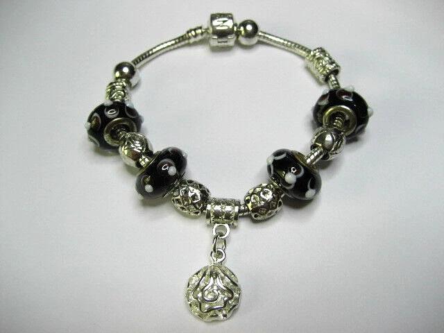 PANDORA Bracelet  of Sterling Silver  -  7 1/2" long & wts 34.56 grams