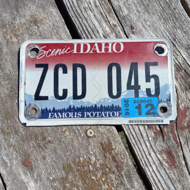 2016 Idaho MOTORCYCLE License Plate - "ZCD 045" 12 2016 sticker FAMOUS POTATOES