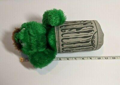 stuffed animal in a can