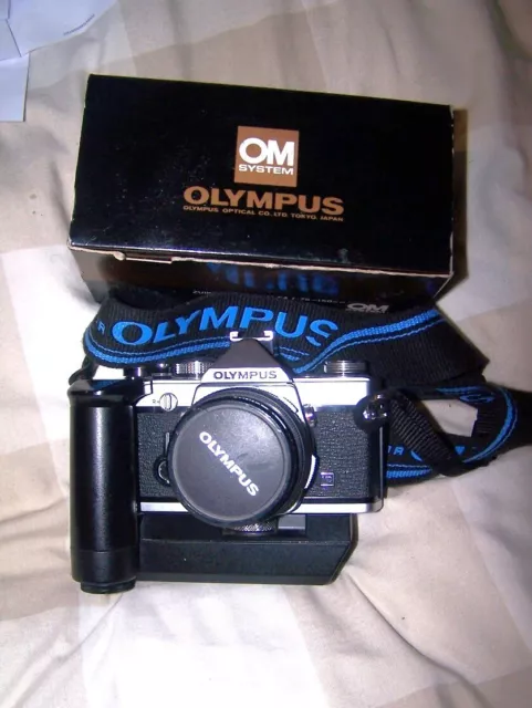 Olympus OM1n SLR Film Camera 1.8 50mm + 75-15mm lens + Many extras