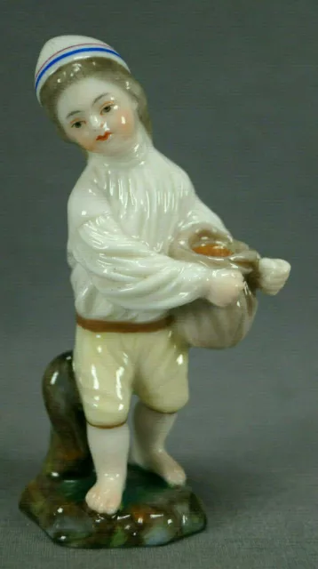 Early 20th Century Hochst Style Hand Painted Boy Carrying Sack Figurine