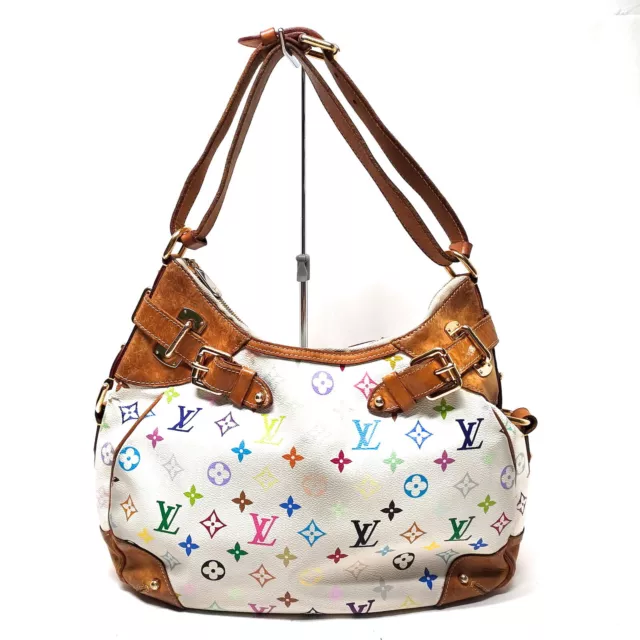 Louis Vuitton label multi-bag purse, features two layered handbags (10x6  and 8x5) and an attached coin pouch. Larger bag of the two has a separate  label that reads, SP2175. - Bunting Online