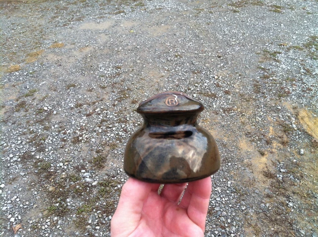 Brown and Black Swirled Ohio Brass Porcelain Insulator