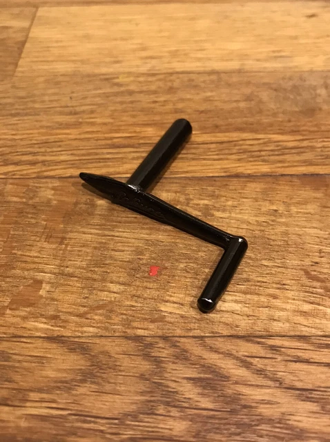 A Lionel Craft tinplate boat, wind up, key and stand, 43cm long