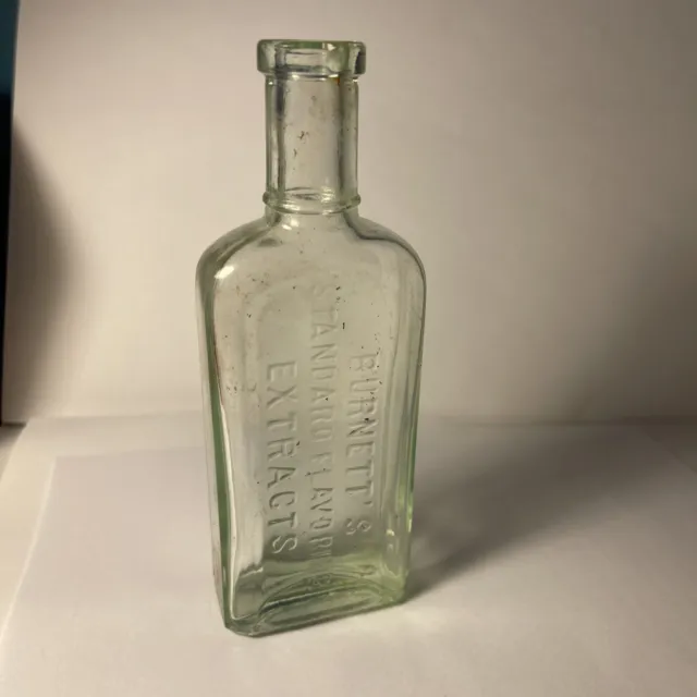 Antique Glass Burnetts Bottle