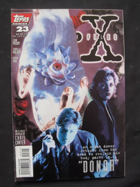 The X FILES # 23 : "DONOR" complete story. MULDER. SCULLY. TOPPS.1996