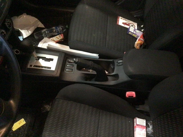 Used Front Lower Center Console fits: 2012 Mitsubishi Lancer floor w/armrest Fro