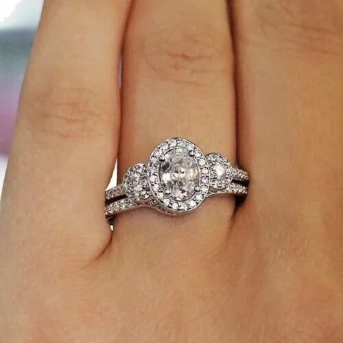 Juego de anillos de boda con halo de diamante de imitación de talla ovalada...