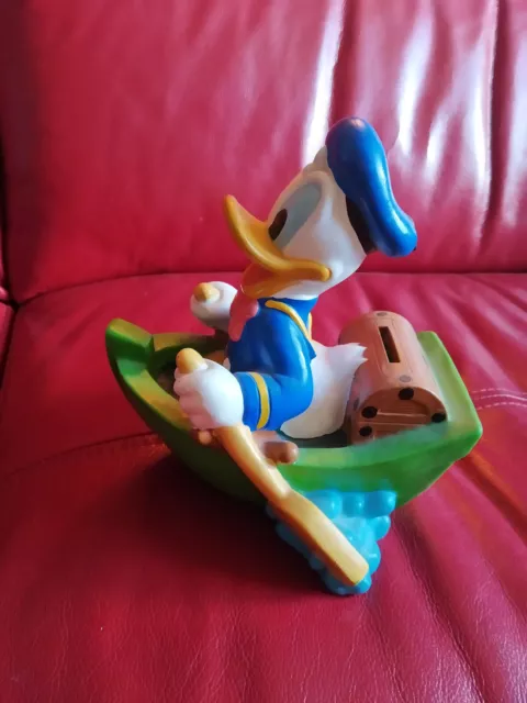 Tirelire Disney      Donald En Barque    Complète & En Très Bon État