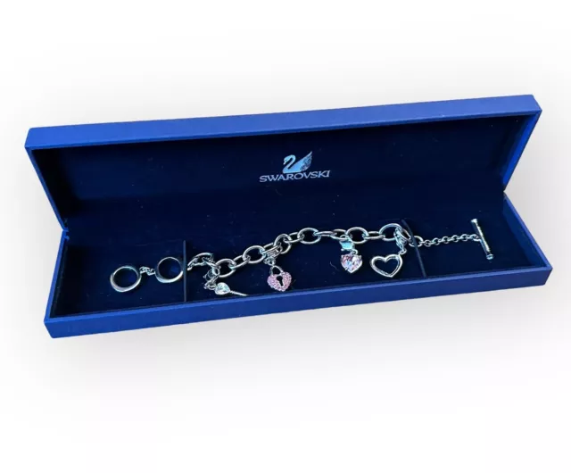 Boxed Signed Swarovski Charm Bracelet Silver Tone Pink Crystals Toggle Clasp