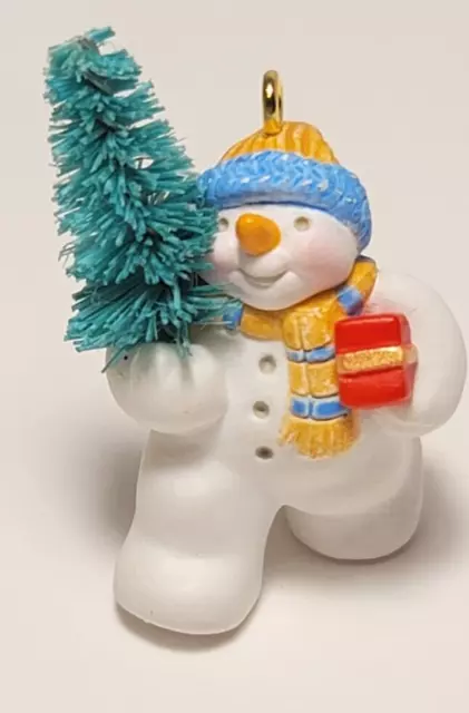 1999 Hallmark Holiday Flurries Snowman Carrying Christmas Tree Mini Ornament