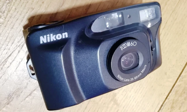 Nikon EM Argentique 35mm + Objectif 50mm, Flash, Filtres, Étui - Occasion