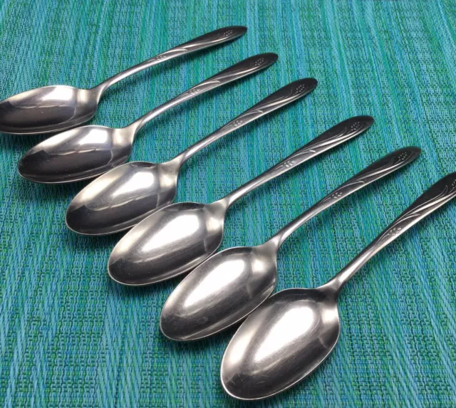 https://www.picclickimg.com/HBYAAOSwGTheIkDT/6-International-Silver-ELEGANCE-Stainless-SERVING-SPOONS-Tablespoons.webp
