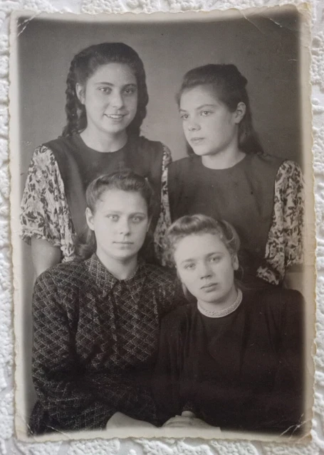 Vintage Photo 1949. Portrait photo of four girls with hairstyles in a room