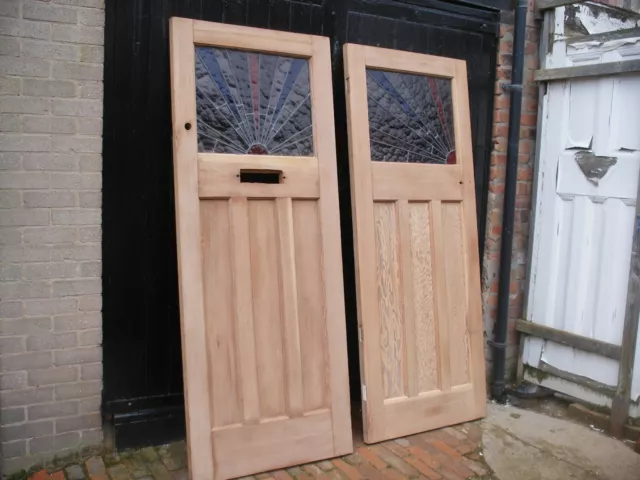 Reclaimed  1930s  stripped pine,  stained glass front doors with sunburst design