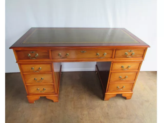 Large Antique Style Reproduction Captains Desk With Green Leather Top.