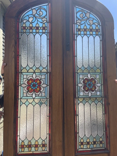 Stunning pair of antique stained glass entry doors- refinished!