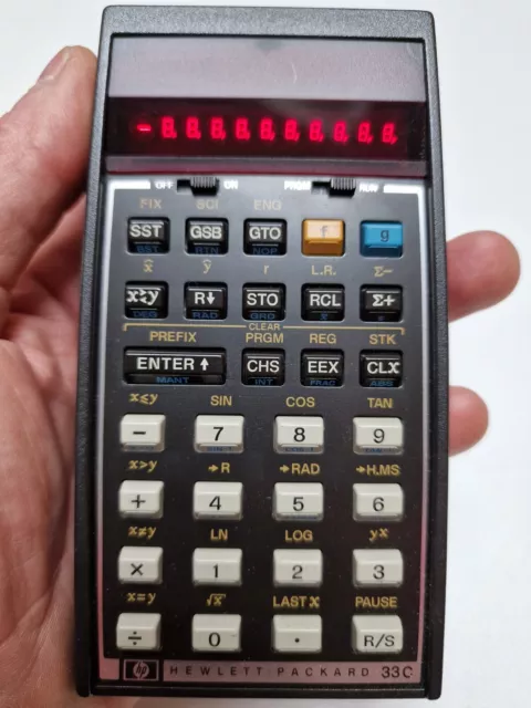 Hewlett-Packard scientific programmable calculator HP-33C with pouch & papers