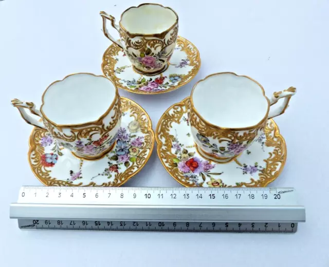 Three Antique Dresden Gilt Cups and Saucers