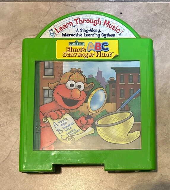Mattel learn through music plus sesame street elmo s abc scavenger hunt