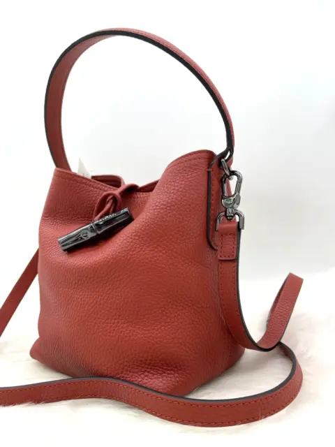 AUTH NWT Longchamp Roseau Essential Pebbled Leather XS Bucket Bag In Sienna