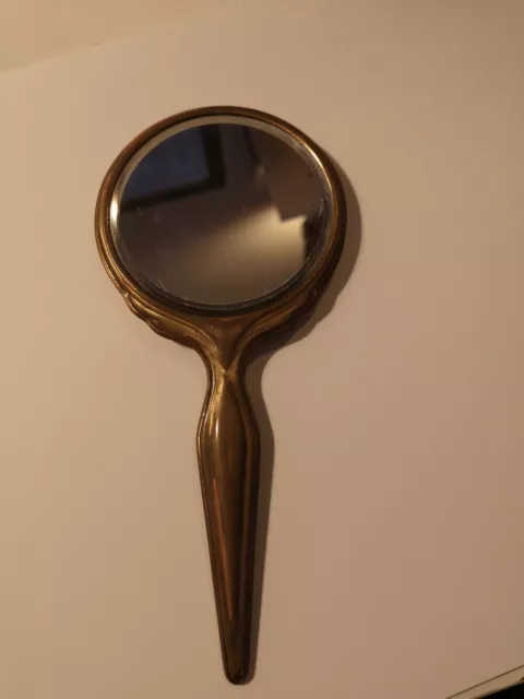 Petit miroir de poche ancien  métal doré - tissus au dos  l.16 cm - D.7 cm