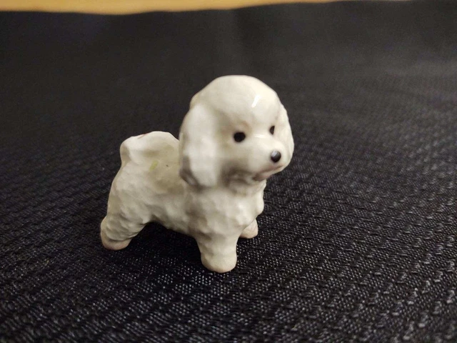 Vtg. white ceramic shaggy poodle. Miniature.