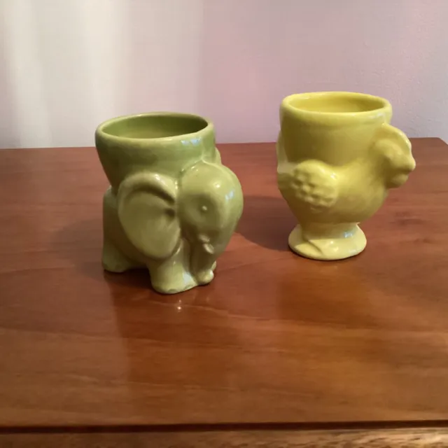 Two vintage novelty ceramic egg cups