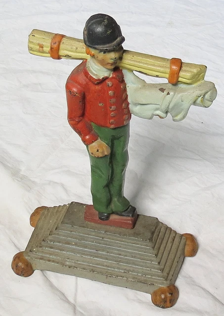 Hand Painted Cast Iron Doorstop Man Carrying Bundle of Poles 2-piece Old Antique