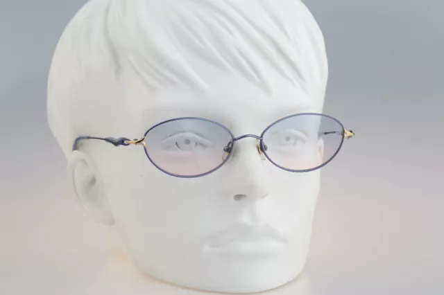Shiseido 2057 4 Titanium, Vintage 90s tinted lenses unique blue oval sunglasses