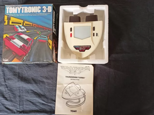 Thundering turbo Tomytronic 3-D Tomy style game and watch en boite